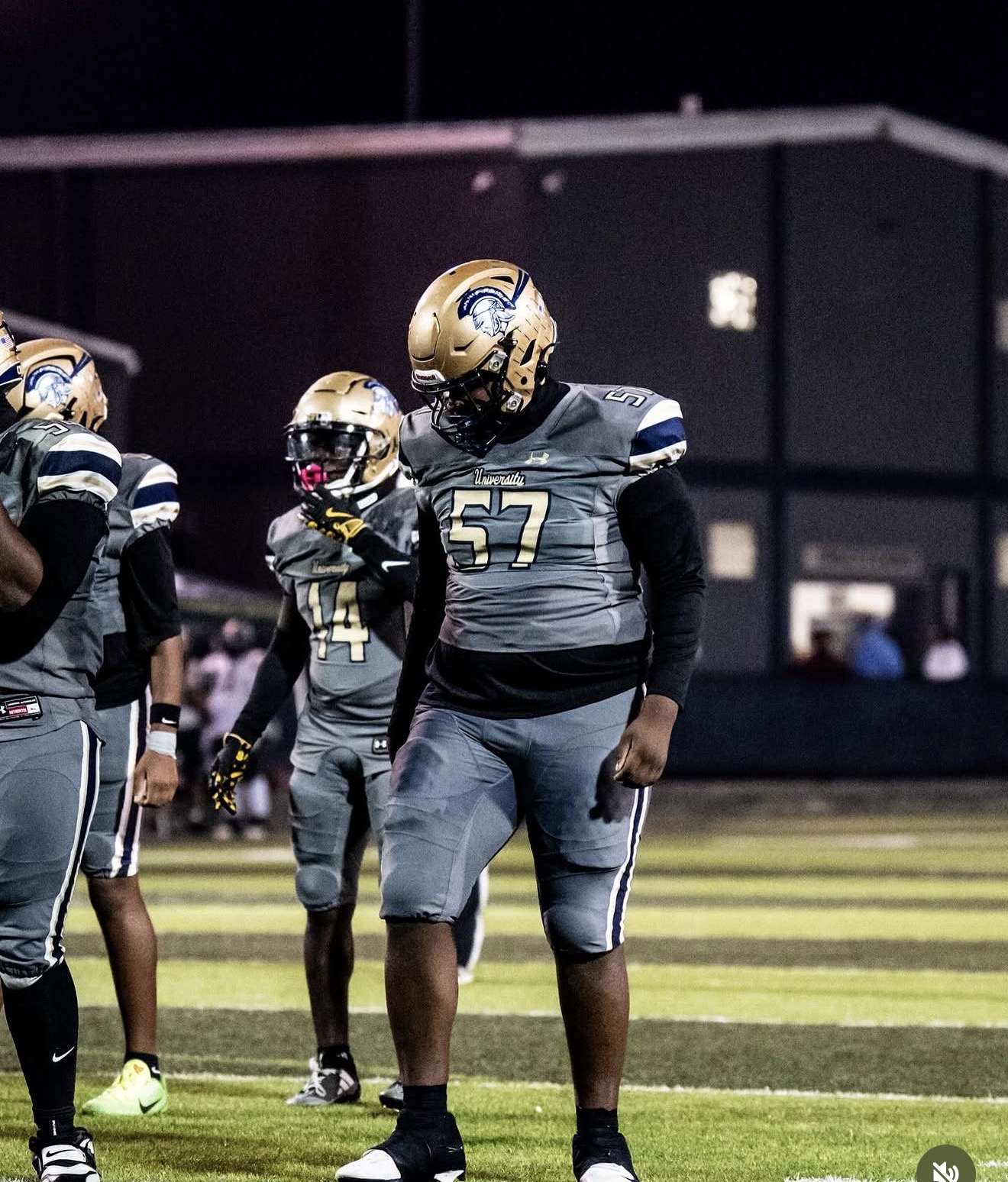 Kayden Hamilton number 57 in gray uniform